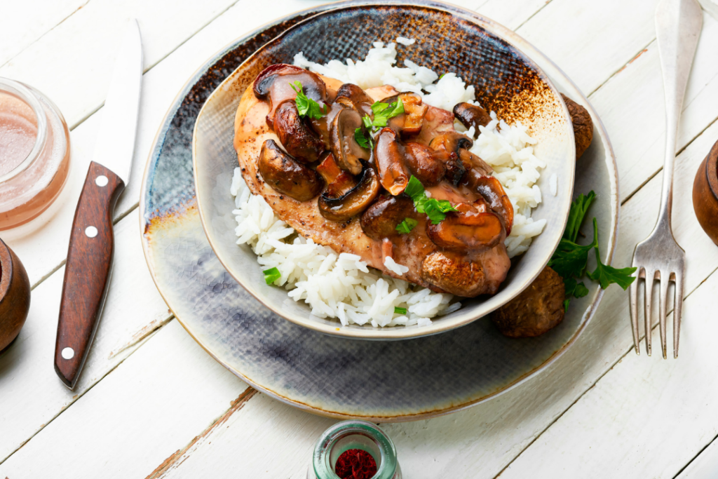 Rice with chicken in mushroom sauce